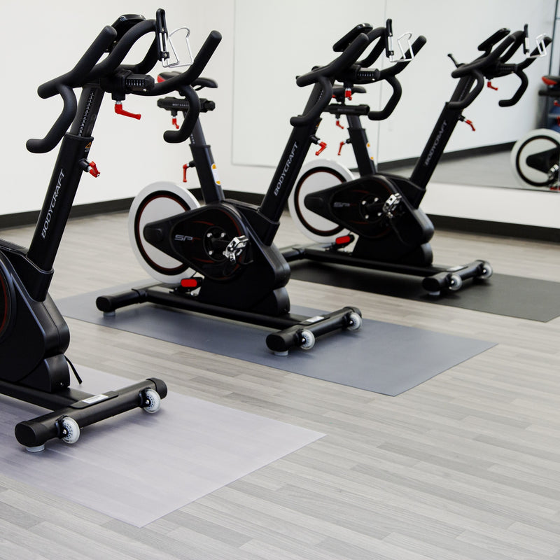 Exercise equipment on Clear, Slate Grey, and Midnight Black Ceramic texture vinyl floor mats