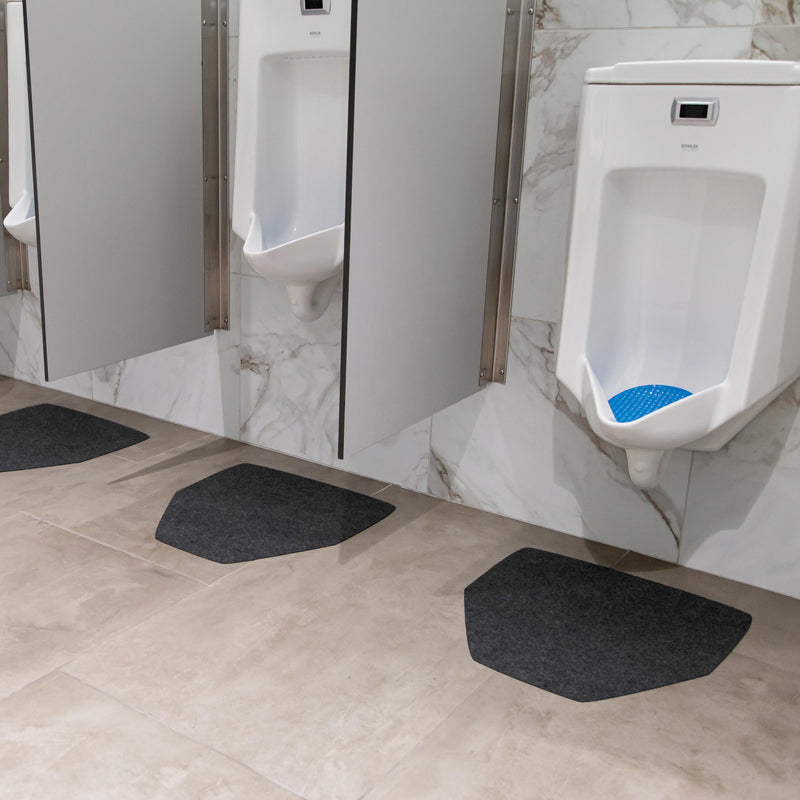 Grey Drip & Dry Urinal Mats beneath urinals