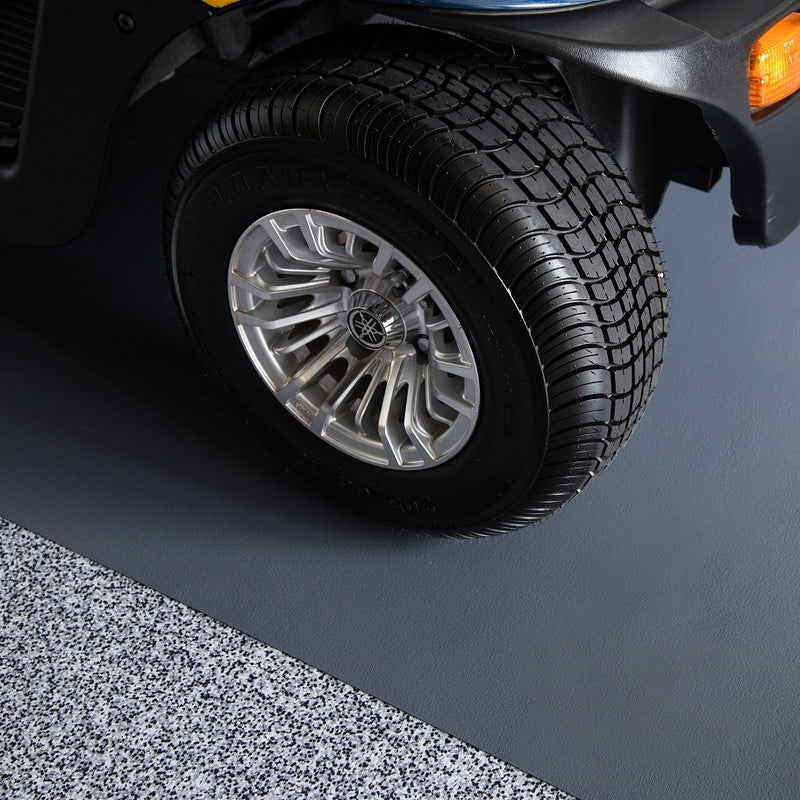 Golf cart tire on Slate Grey Ceramic texture vinyl golf cart mat