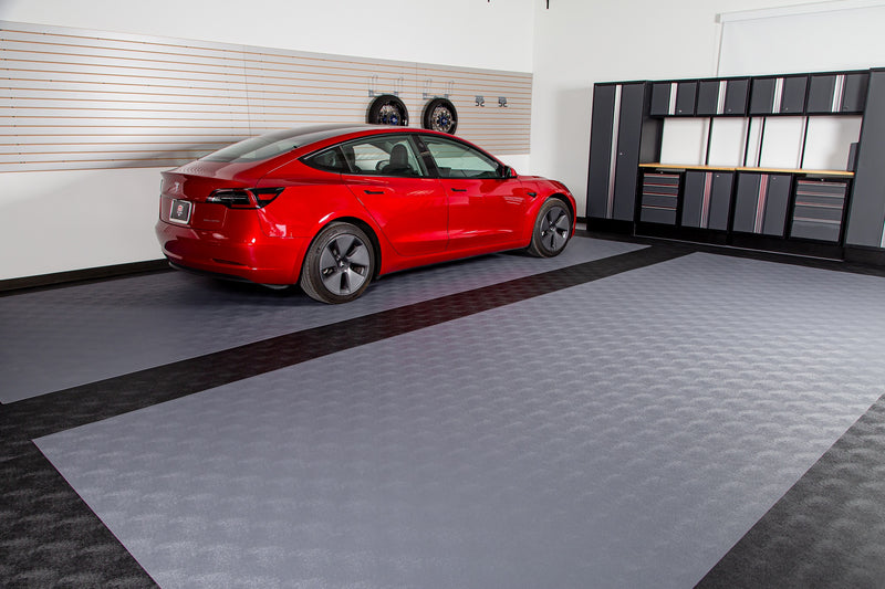 Red car on Slate Grey Levant texture vinyl flooring with Midnight Black vinyl runners