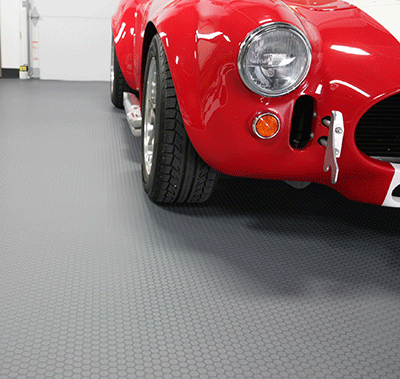 Red car on top of Slate Grey Small Coin texture vinyl flooring