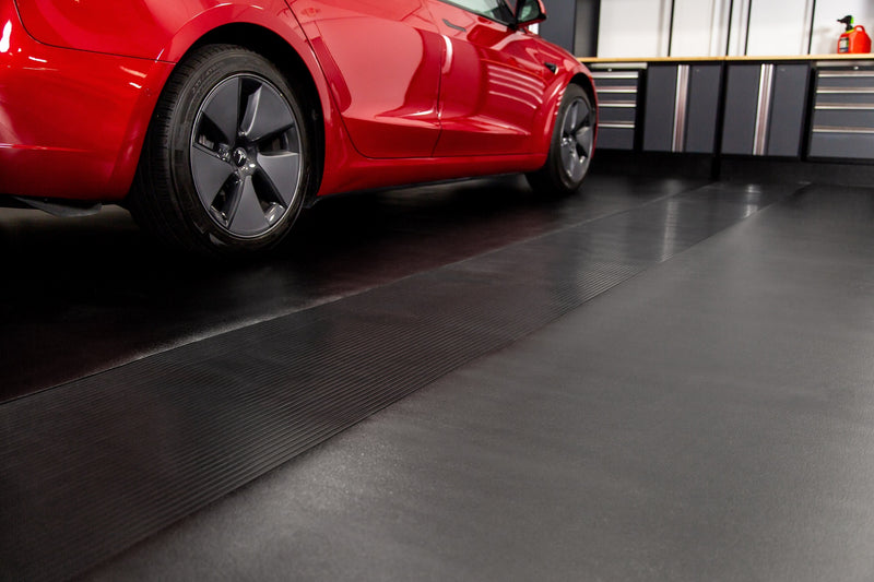 Red car on Midnight Black Ceramic texture vinyl flooring with Ribbed texture runner