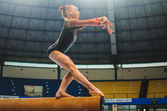 The Hidden Dangers of Gymnastics and Cheerleading – And How the Right Flooring Can Help