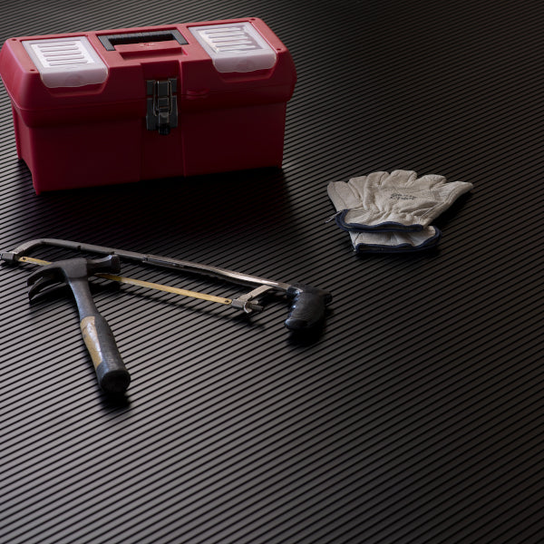 Toolbox and tools on Ribbed Channel flooring