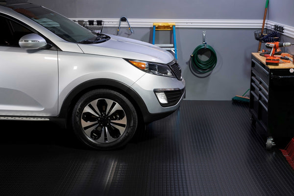 Silver SUV on Midnight Black large Coin texture vinyl flooring
