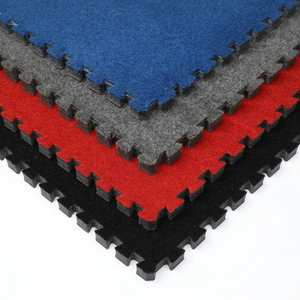 Stacked carpet bonded foam gym flooring tiles in black, red, charcoal and blue, showing foam thickness and edge