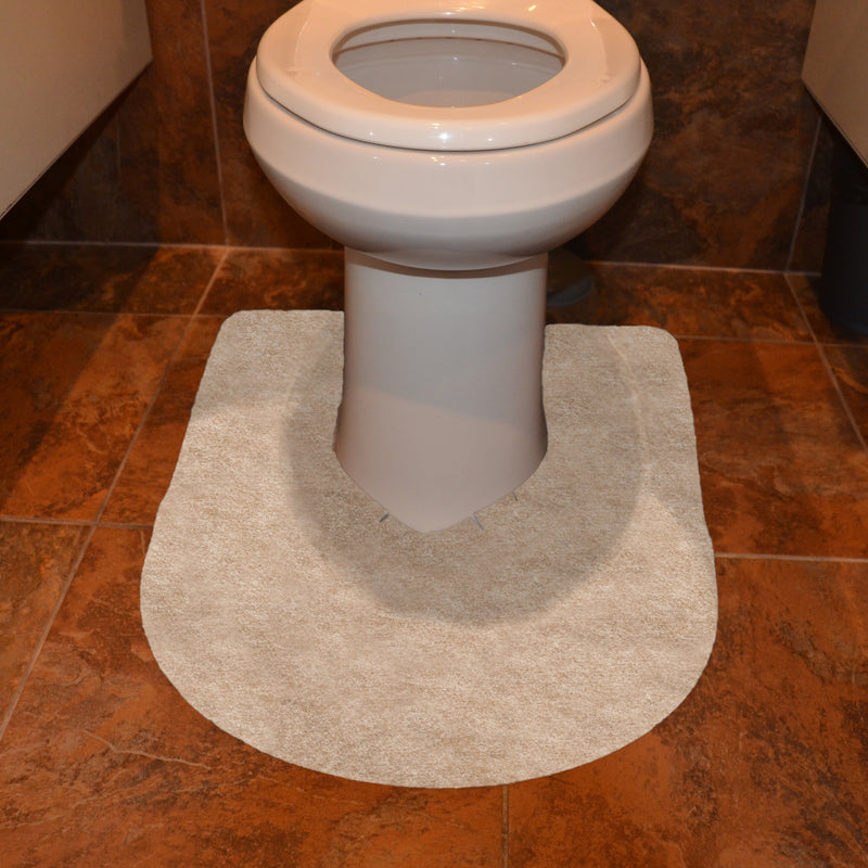 Tan Drip & Dry toilet mat at base of toilet pedestal