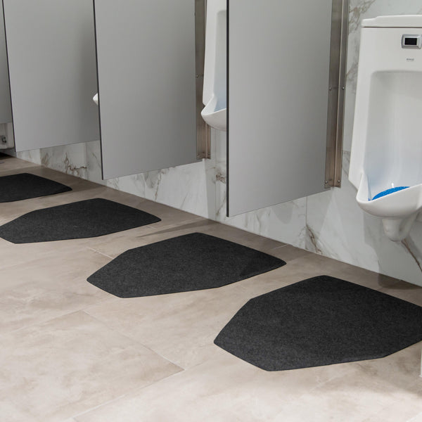 Grey Drip & Dry Urinal Mats beneath urinals
