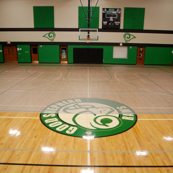 Clear vinyl activity flooring on wood basketball court