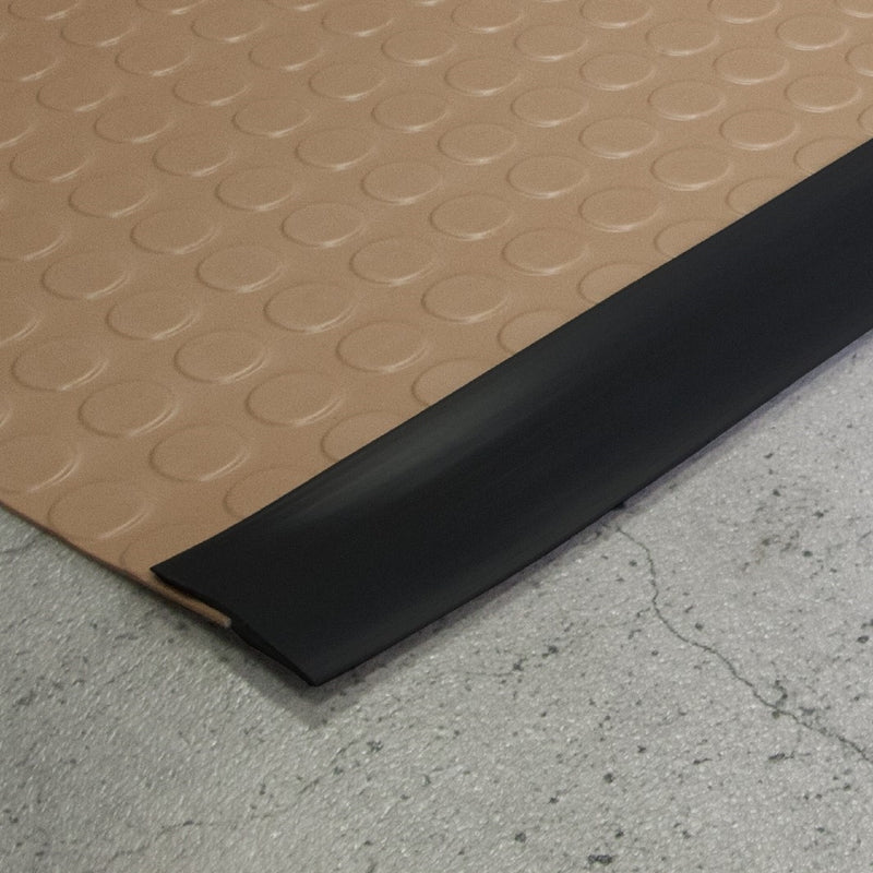 Black vinyl edge trim on Sandstone large Coin texture vinyl flooring