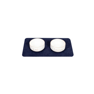 Pet food bowls on top of Blue Drip & Dry pet bowl mat