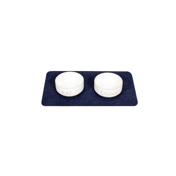 Pet food bowls on top of Blue Drip & Dry pet bowl mat