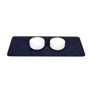 Pet food bowls on top of Blue Drip & Dry pet bowl mat