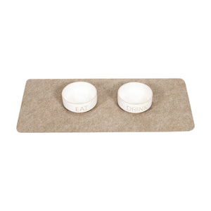 Pet food bowls on top of Tan Drip & Dry pet bowl mat