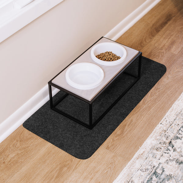 Pet food bowls on top of Grey Drip & Dry pet bowl mat