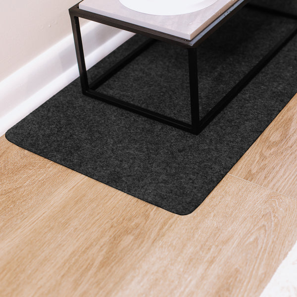 Pet food bowls on top of Grey Drip & Dry pet bowl mat