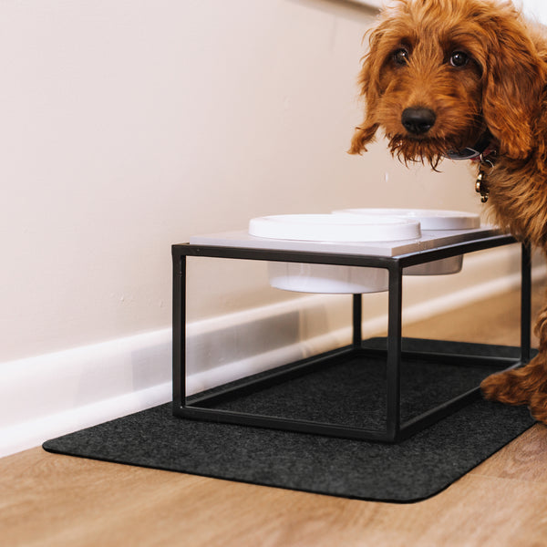 Pet food bowls on top of Grey Drip & Dry pet bowl mat