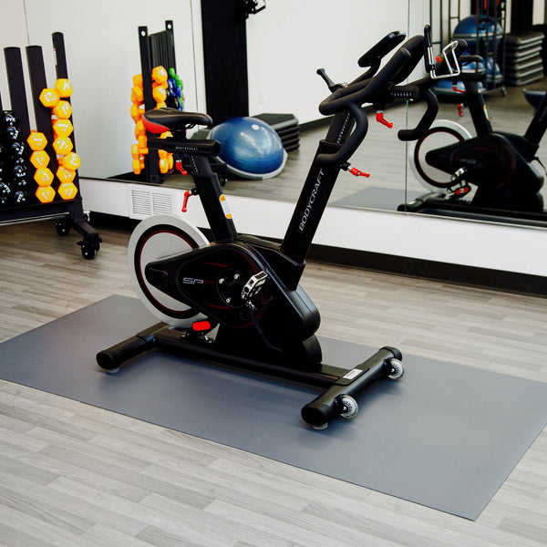 Stationary bike on Slate Grey Ceramic texture vinyl floor mat