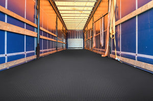 Midnight Black Small Coin texture vinyl trailer flooring installed in trailer