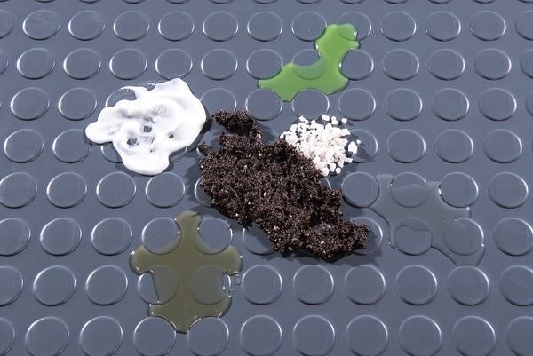 G-Floor slate grey rollout garage flooring is resistant to chemicals
