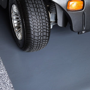 Golf cart tire on Slate Grey Ceramic texture vinyl golf cart mat
