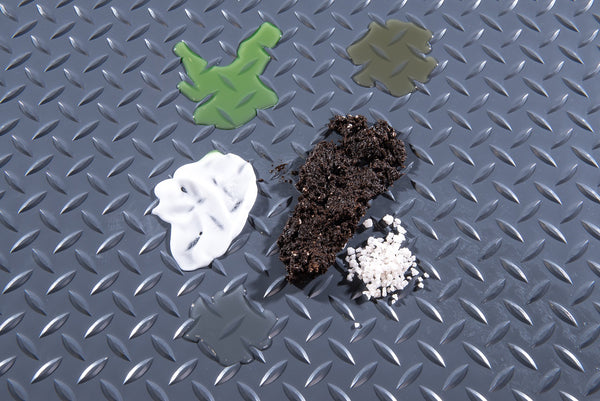 Diamond Tread texture in slate grey shown with Chemicals (dirt, antifreeze, oil, road salt) to show resistance and containment
