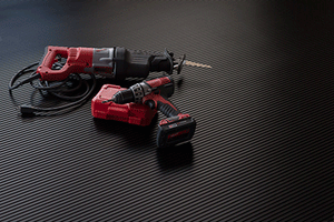 Ribbed texture garage mat in midnight black shown with power tools on the mat for illustrative purposes