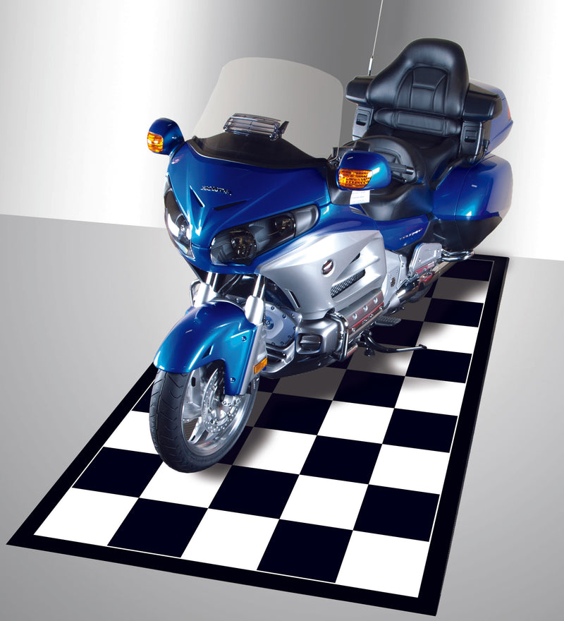 Black and white checkerboard mat with black border shown with a blue Gold Wing motorcycle on the mat used to show usage example 