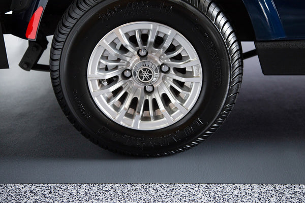 Golf cart wheel on Slate Grey Ceramic texture vinyl golf cart mat