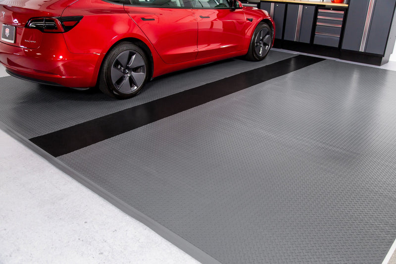 Red car on Slate Grey Diamond Tread texture vinyl flooring with Midnight Black Ribbed texture runner