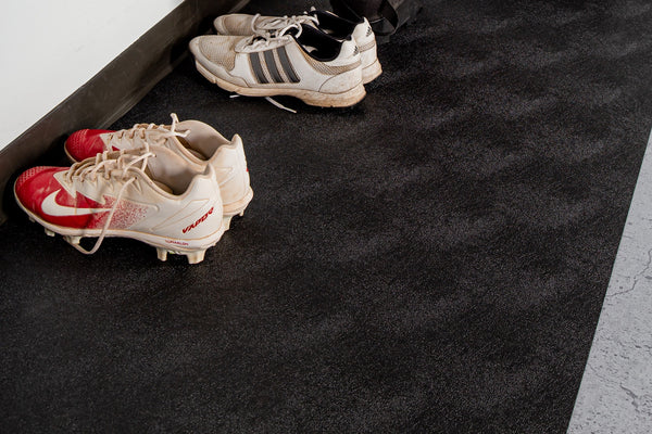 Cleats on Midnight Black Levant texture vinyl runner