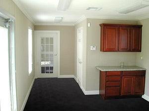 Midnight Black Levant texture vinyl flooring installed in modular unit